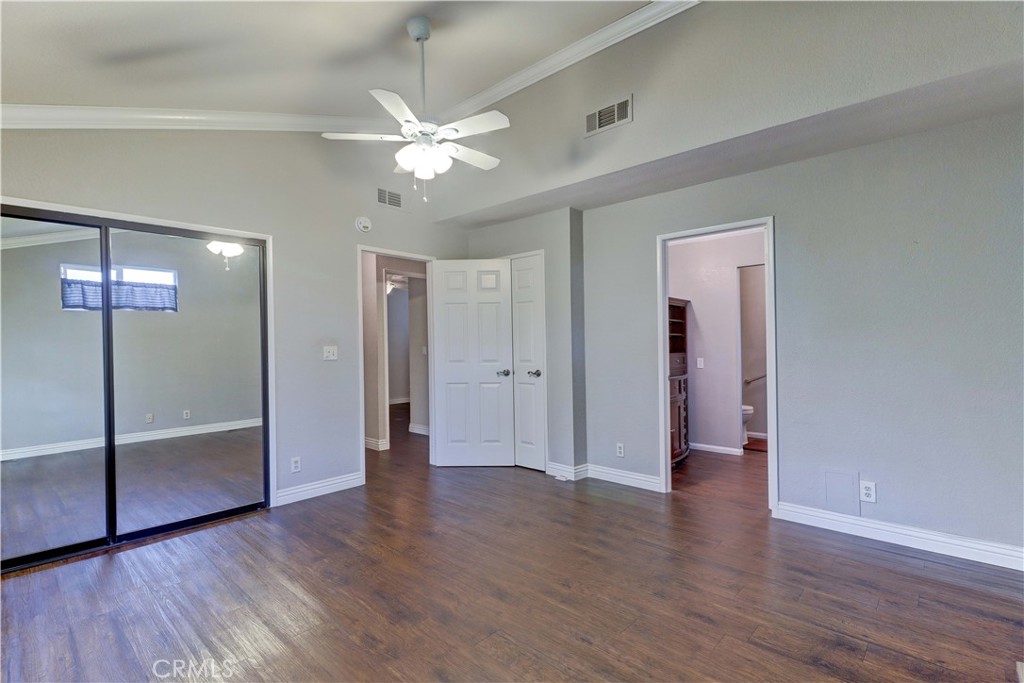 2509 View Lake Santa Ana, CA 92705 - Photo 29 of 74 a view of a hallway with wooden floor