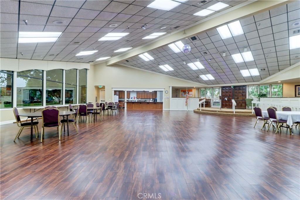 2509 View Lake Santa Ana, CA 92705 - Photo 65 of 74 a view of a dining room with furniture window and wooden floor