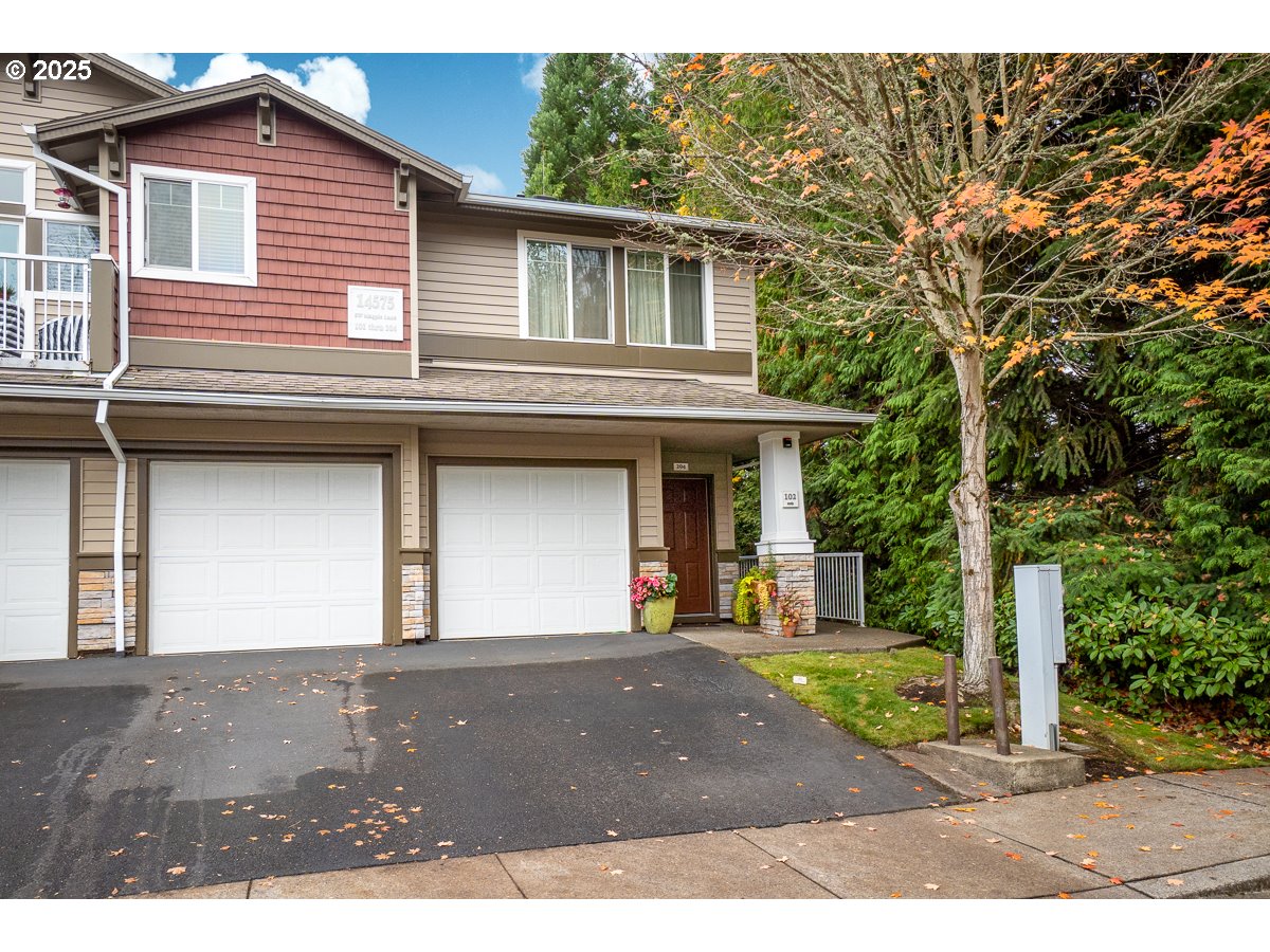 14575 Southwest Magpie Lane, Unit 102 Beaverton, OR 97007 - Photo 2 of 30 a house view with a outdoor space