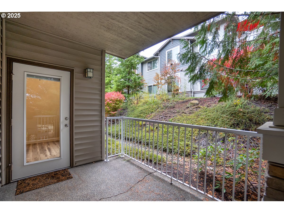 14575 Southwest Magpie Lane, Unit 102 Beaverton, OR 97007 - Photo 29 of 30 a view of entryway with a front door