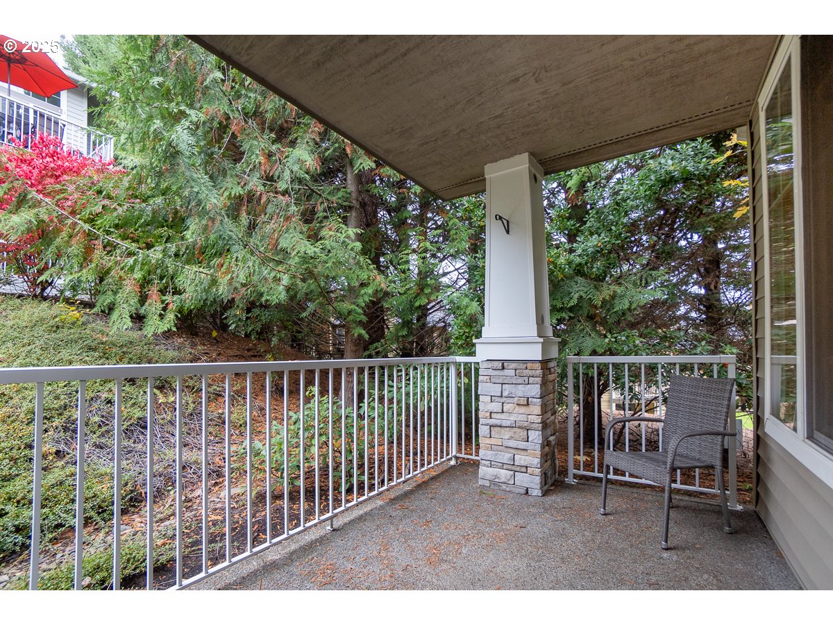 14575 Southwest Magpie Lane, Unit 102 Beaverton, OR 97007 - Photo 30 of 30 a balcony with outdoor view