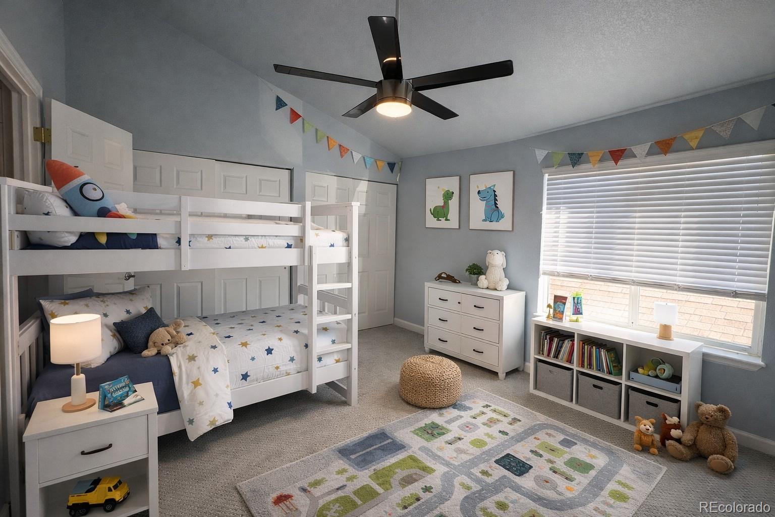 805 Summer Drive Highlands Ranch, CO 80126 - Photo 7 of 10 a bedroom with furniture and a window