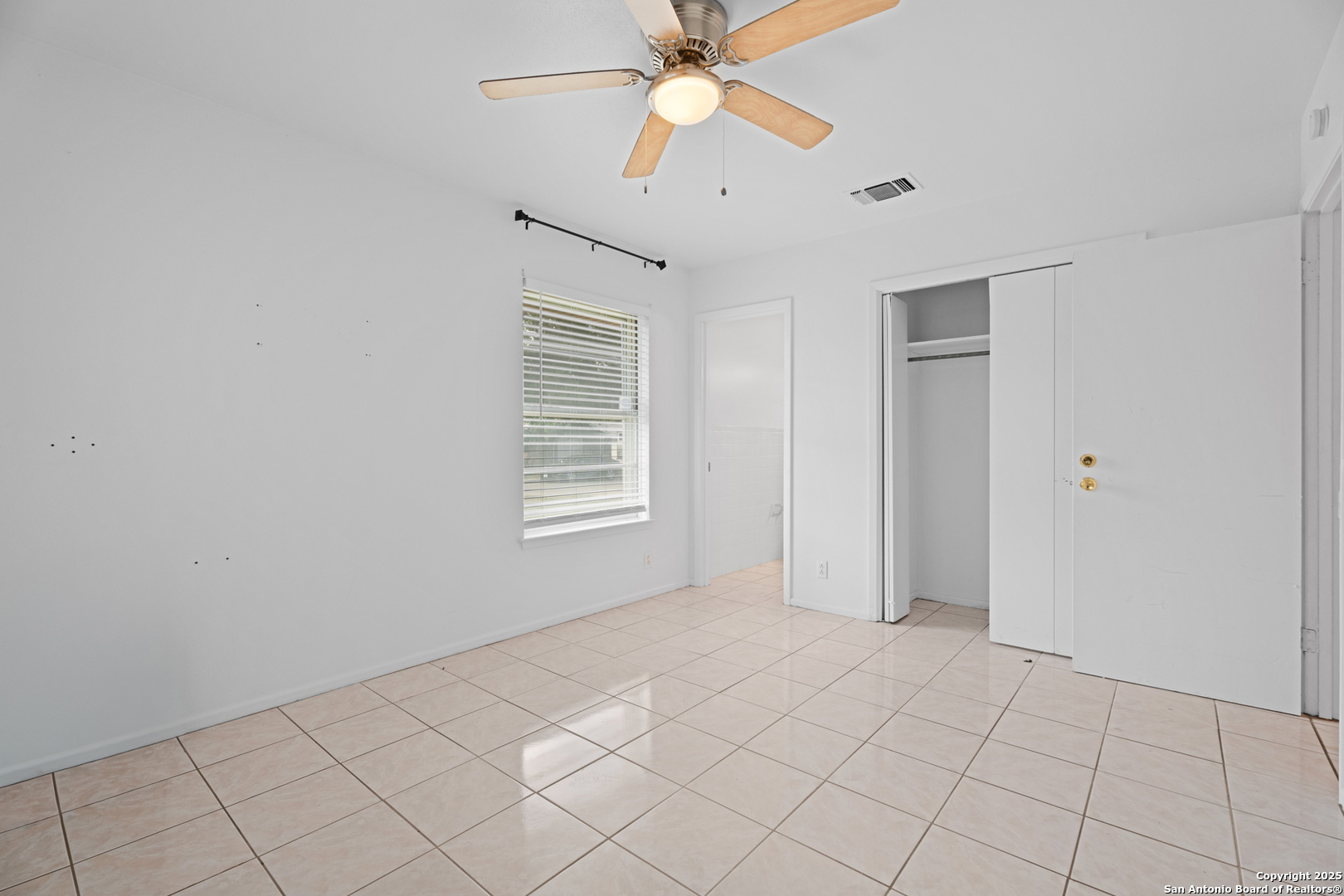 4427 First View Drive San Antonio, TX 78217 - Photo 16 of 26 a view of an empty room with a window