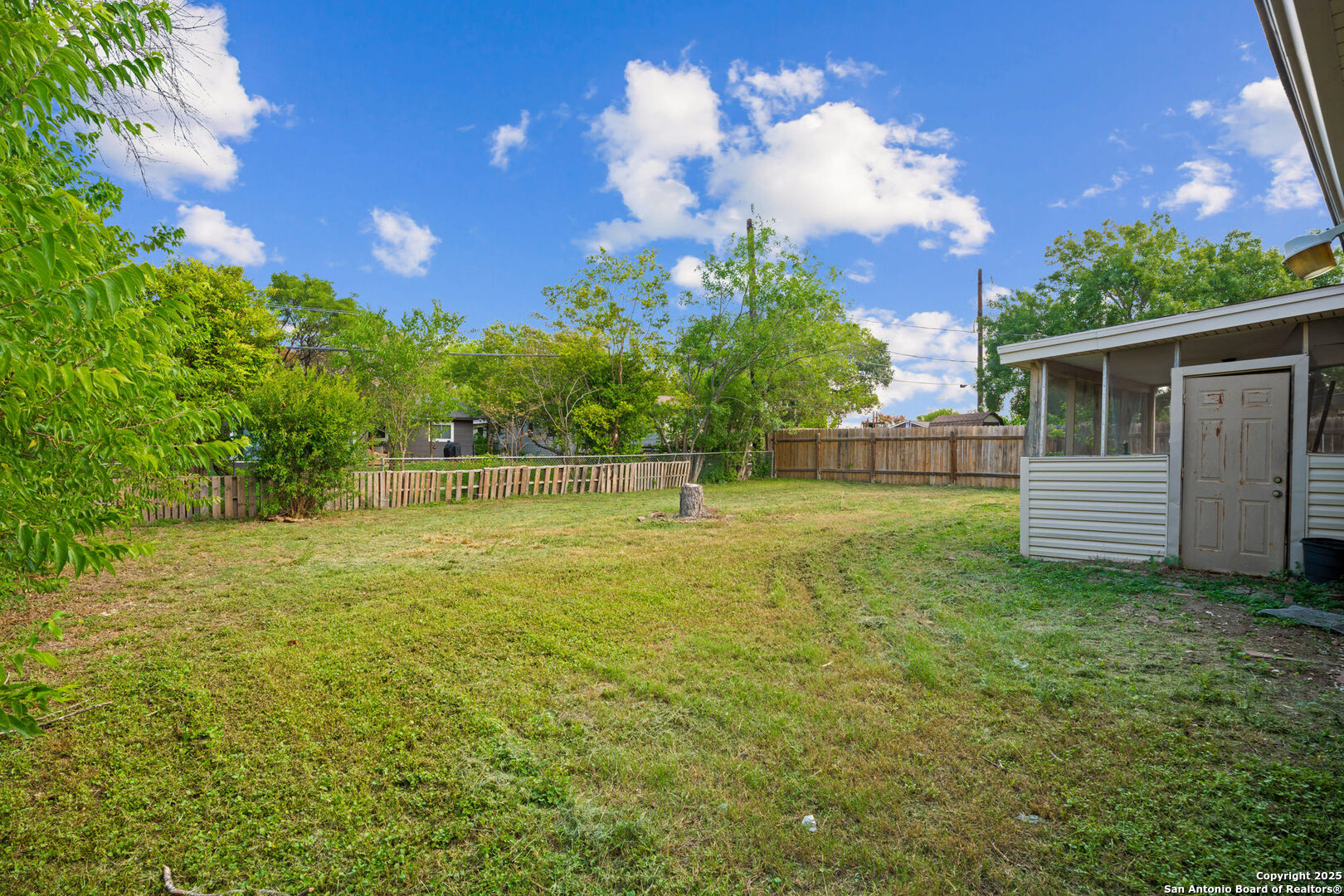 4427 First View Drive San Antonio, TX 78217 - Photo 25 of 26 a backyard of a house with lots of green space