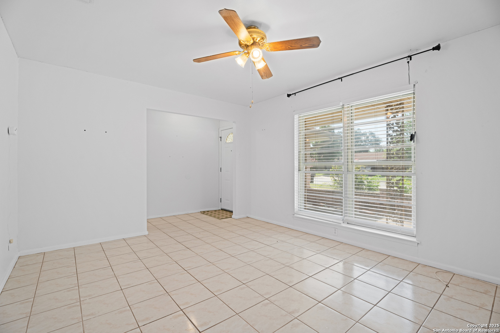 4427 First View Drive San Antonio, TX 78217 - Photo 8 of 26 a view of an empty room with a window