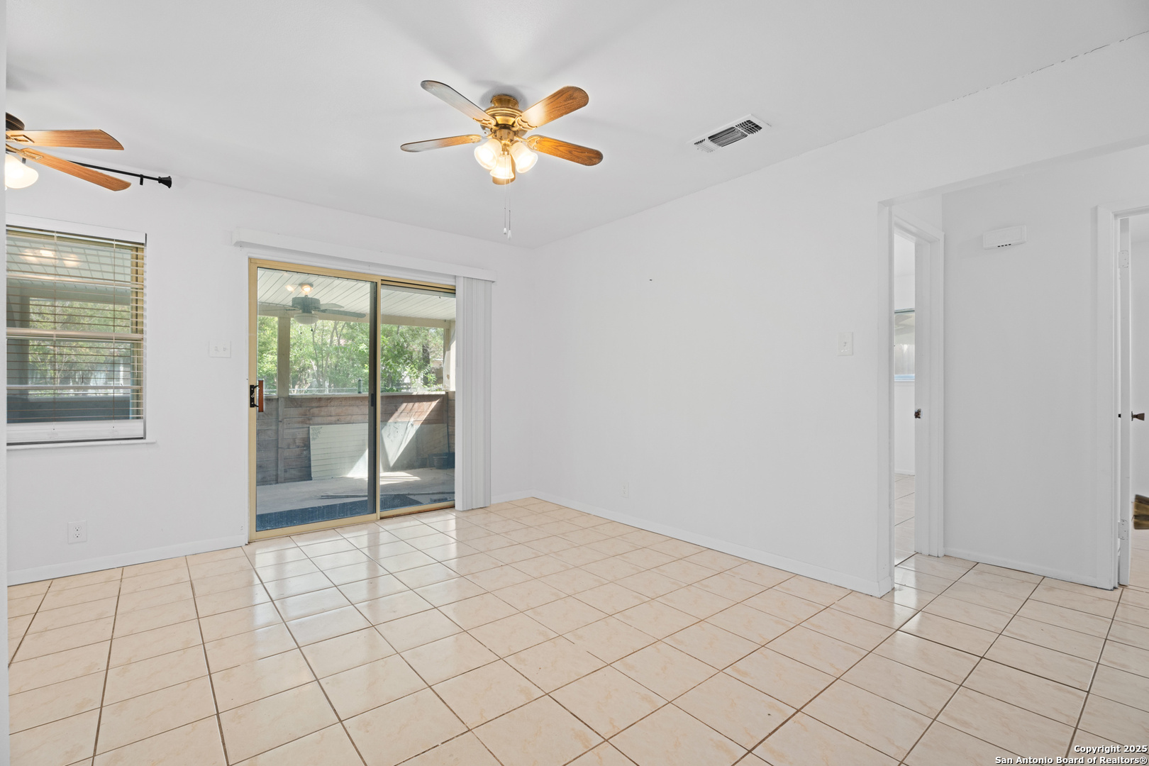 4427 First View Drive San Antonio, TX 78217 - Photo 9 of 26 a view of an empty room and window