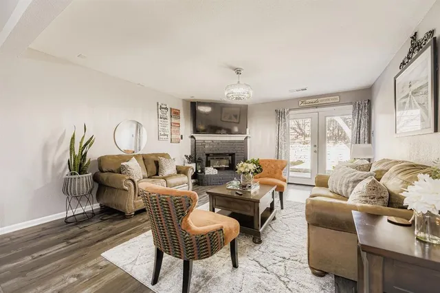 a living room with furniture or couch and a window