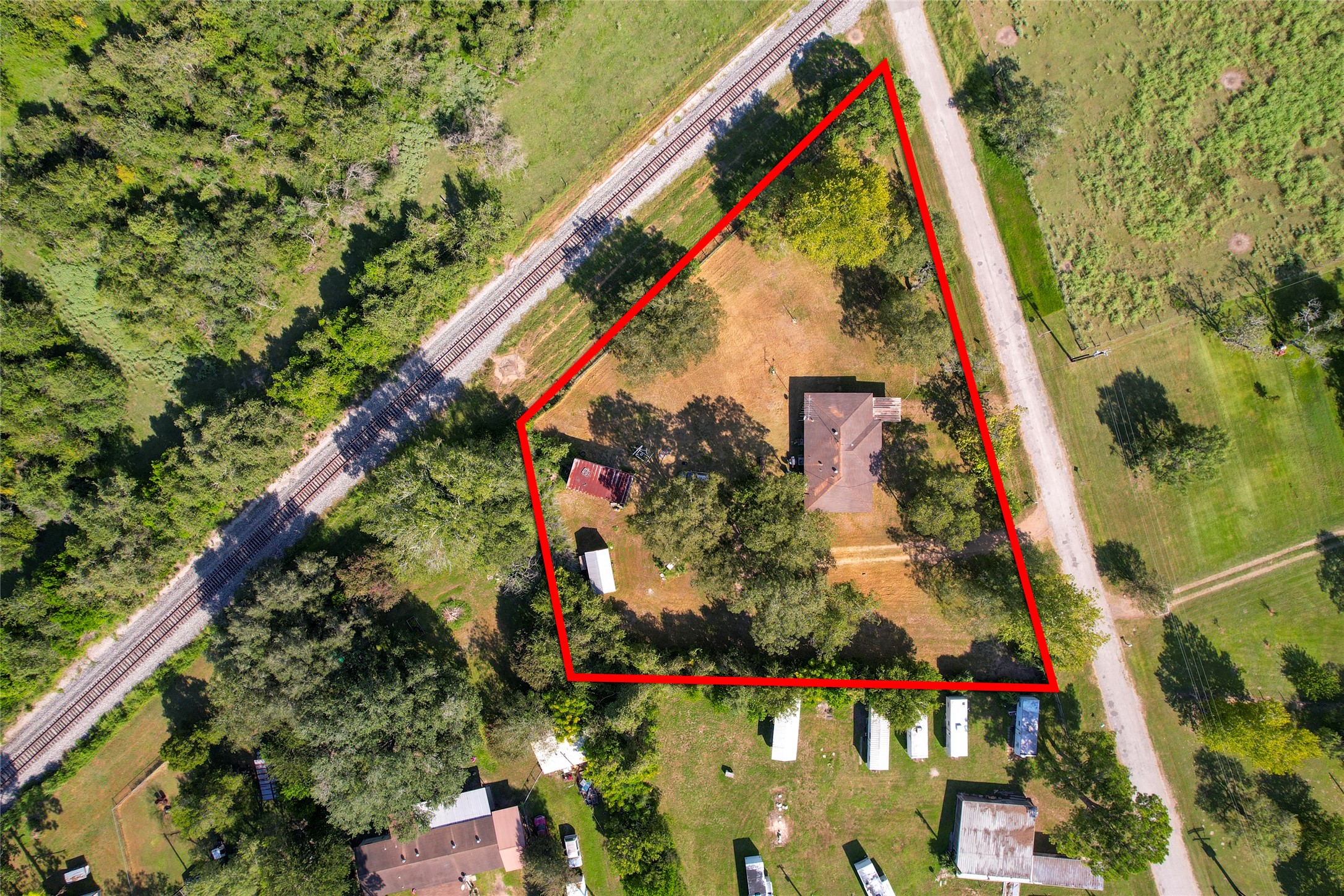 401 Anderson Road Cuero, TX 77954 - Photo 3 of 26 Spacious front yard with scenic surroundings