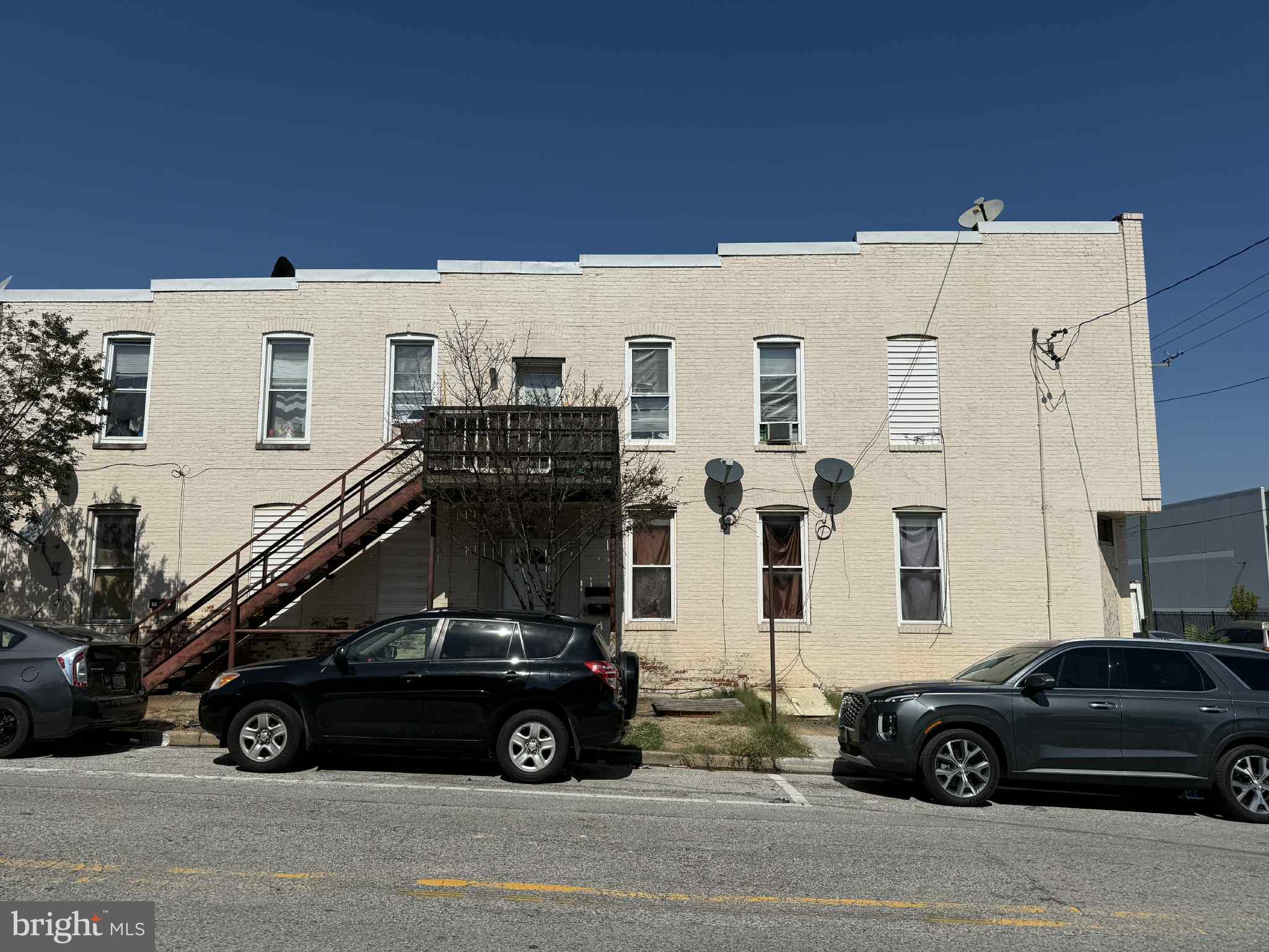 a car parked in front of a house