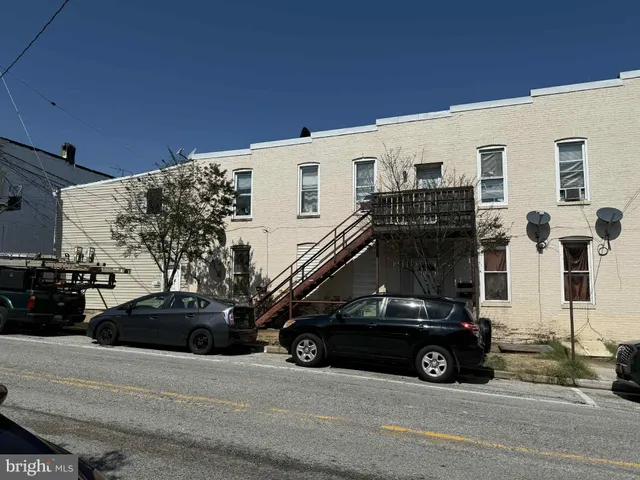 a car parked in front of a building