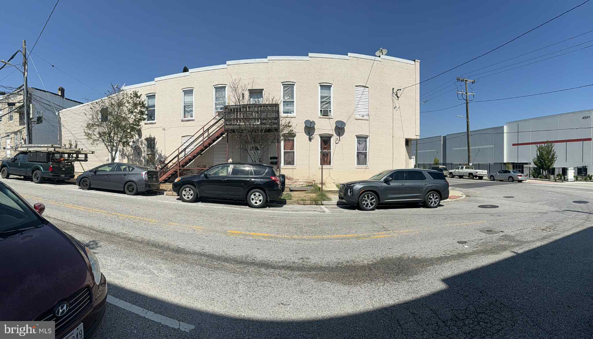 4718 Curtis Avenue Curtis Bay, MD 21226 - Photo 3 of 3 a view of building with car parked