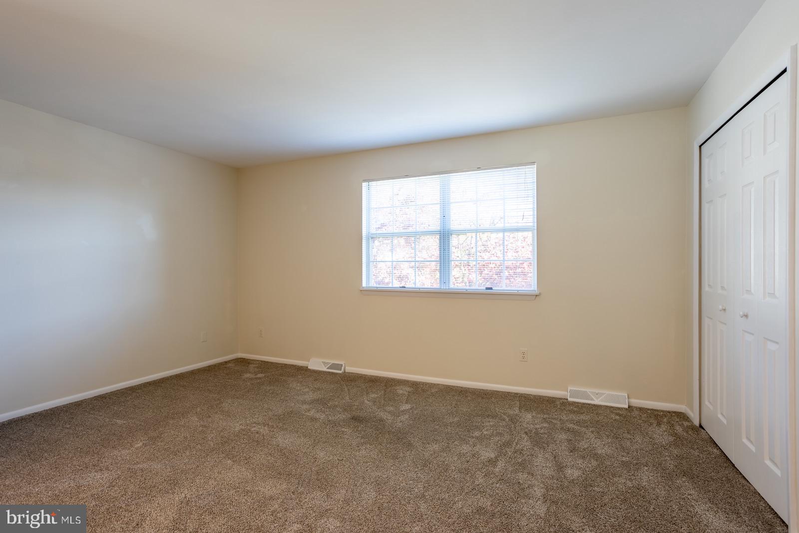 143 Midland Road Glen Burnie, MD 21060 - Photo 18 of 44 an empty room with a window