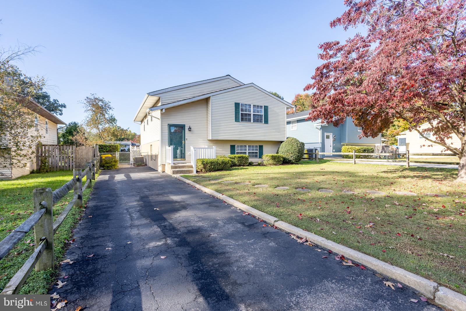 143 Midland Road Glen Burnie, MD 21060 - Photo 2 of 44 a front view of house with yard and green space