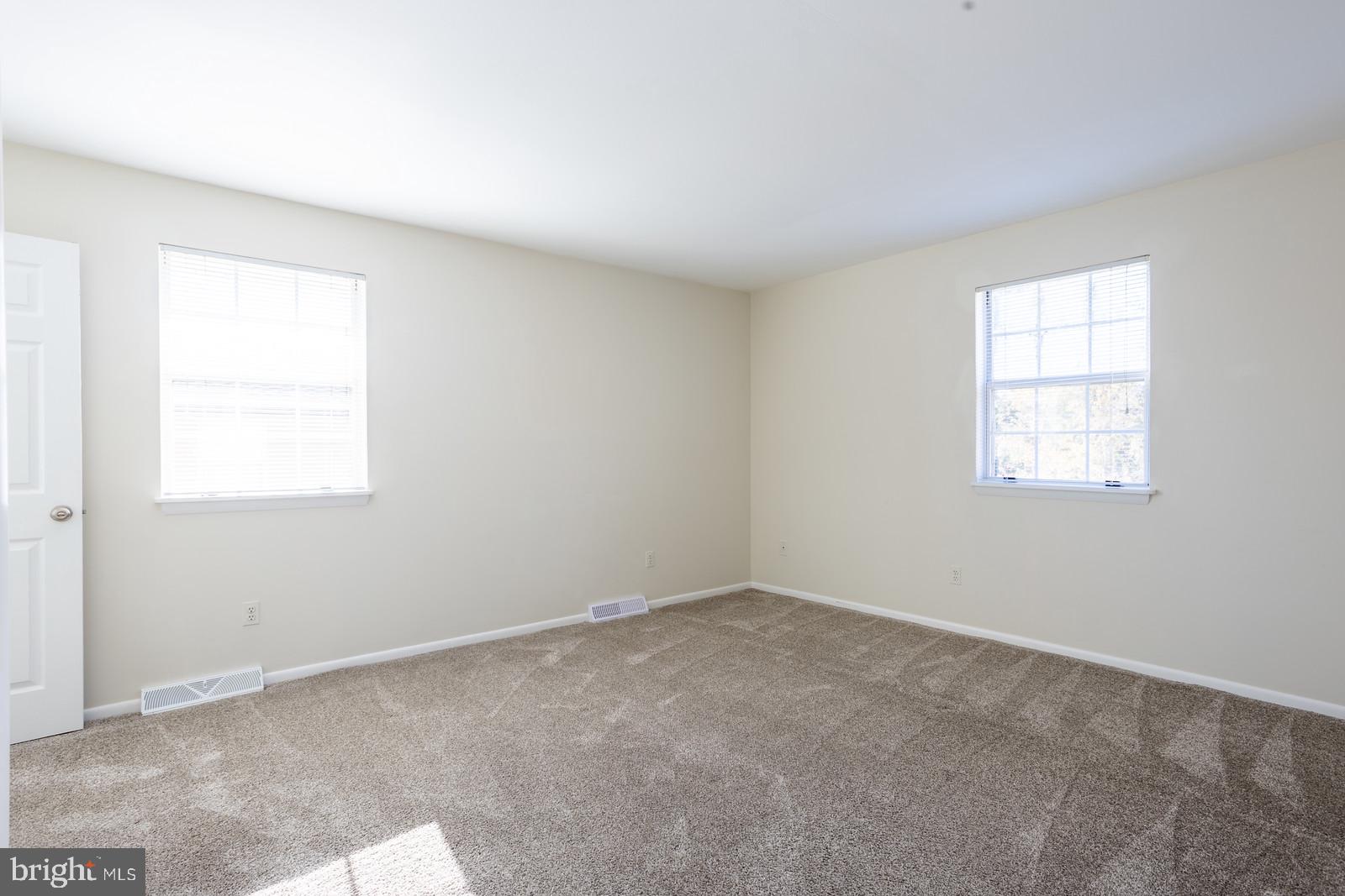 143 Midland Road Glen Burnie, MD 21060 - Photo 21 of 44 an empty room with a window