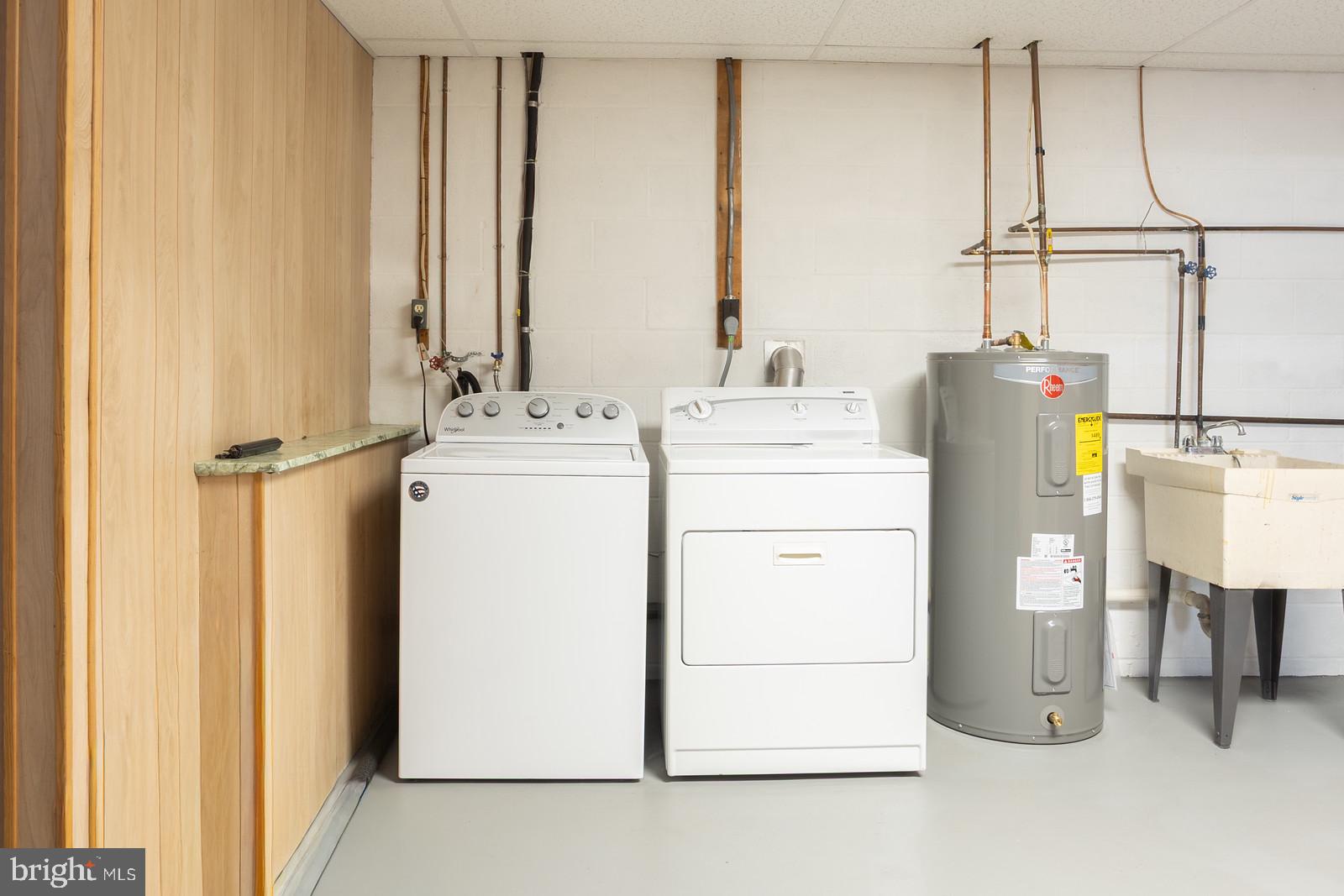 143 Midland Road Glen Burnie, MD 21060 - Photo 38 of 44 a utility room with dryer and washer