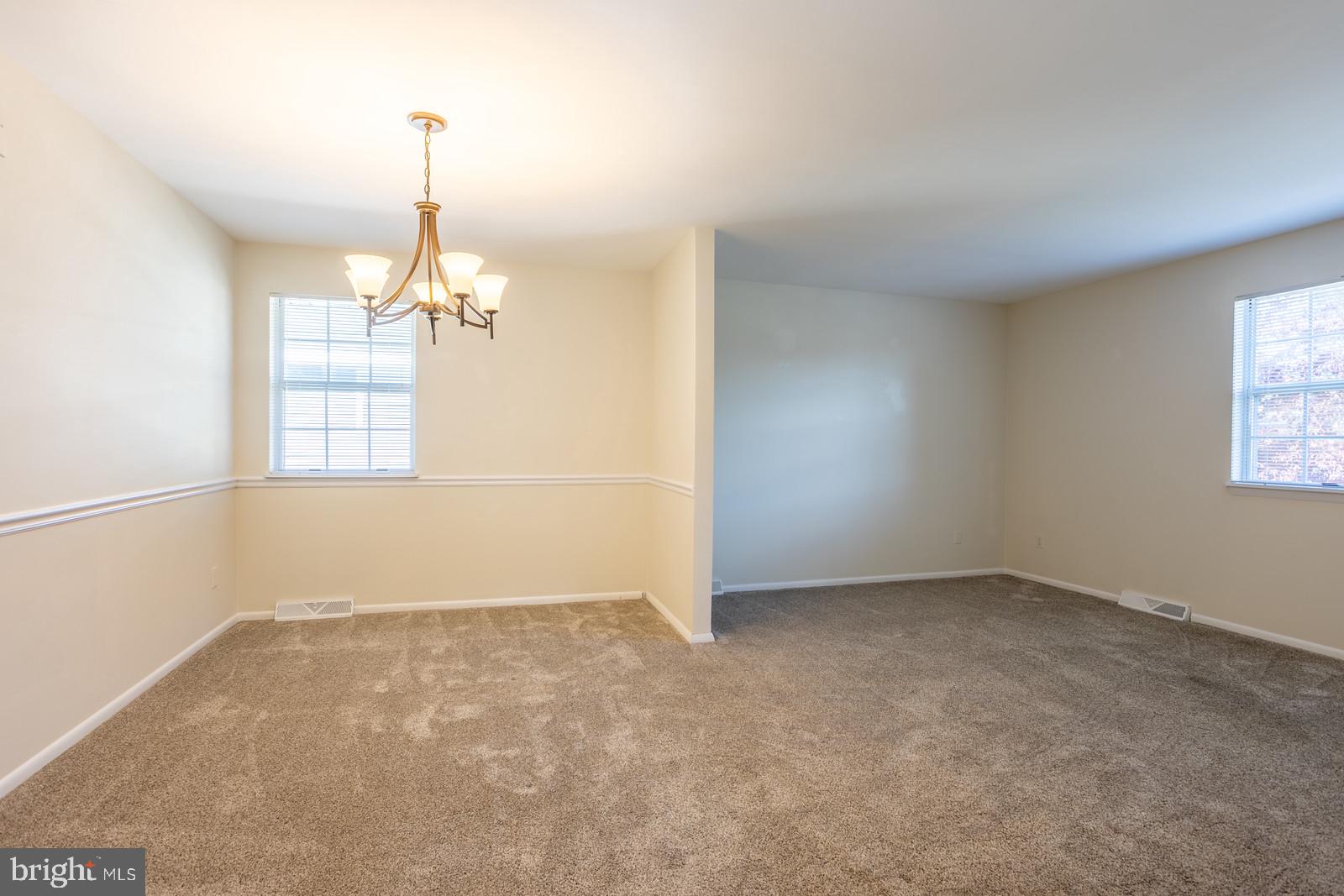 143 Midland Road Glen Burnie, MD 21060 - Photo 8 of 44 an empty room with windows