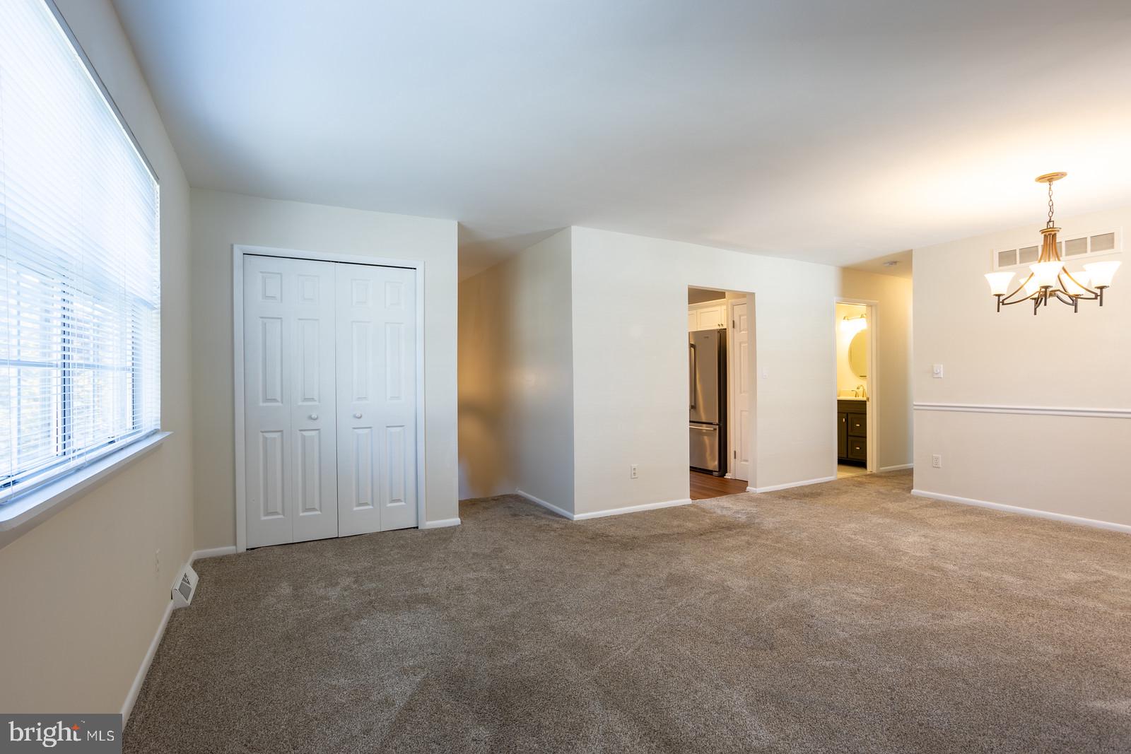 143 Midland Road Glen Burnie, MD 21060 - Photo 9 of 44 an empty room with windows and closet
