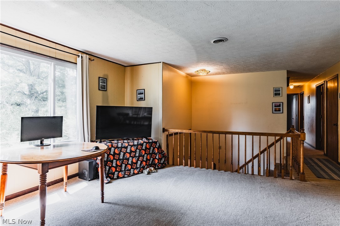 279 Spence Road Belpre, OH 45714 - Photo 11 of 40 Carpeted home office featuring a textured ceiling
