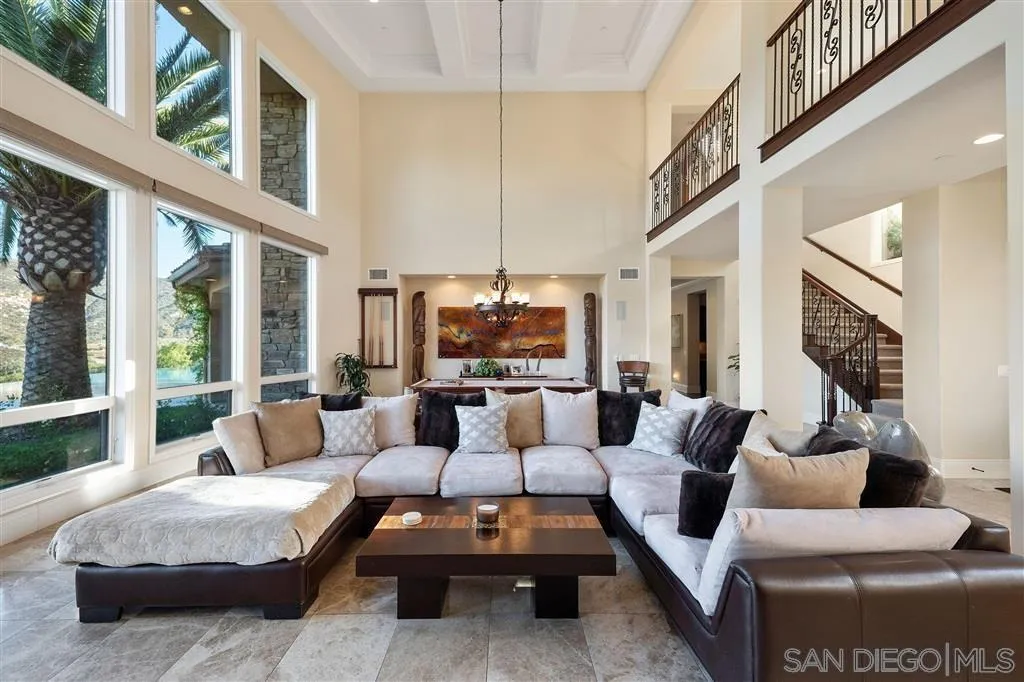 14480 Cheyenne Trail Poway, CA 92064 - Photo 12 of 23 a living room with furniture fireplace and a large window