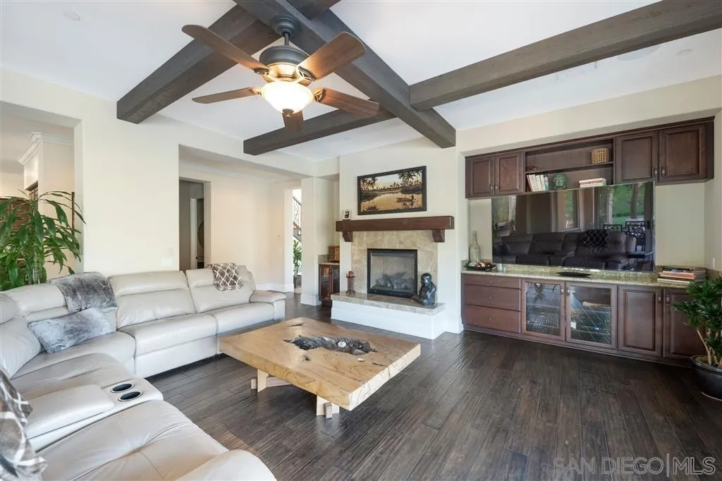 14480 Cheyenne Trail Poway, CA 92064 - Photo 14 of 23 a living room with furniture and a fireplace