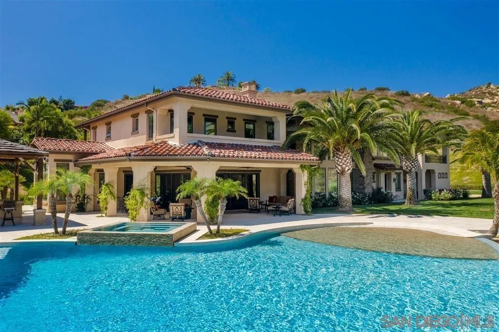 14480 Cheyenne Trail Poway, CA 92064 - Photo 2 of 23 a front view of a building with garden