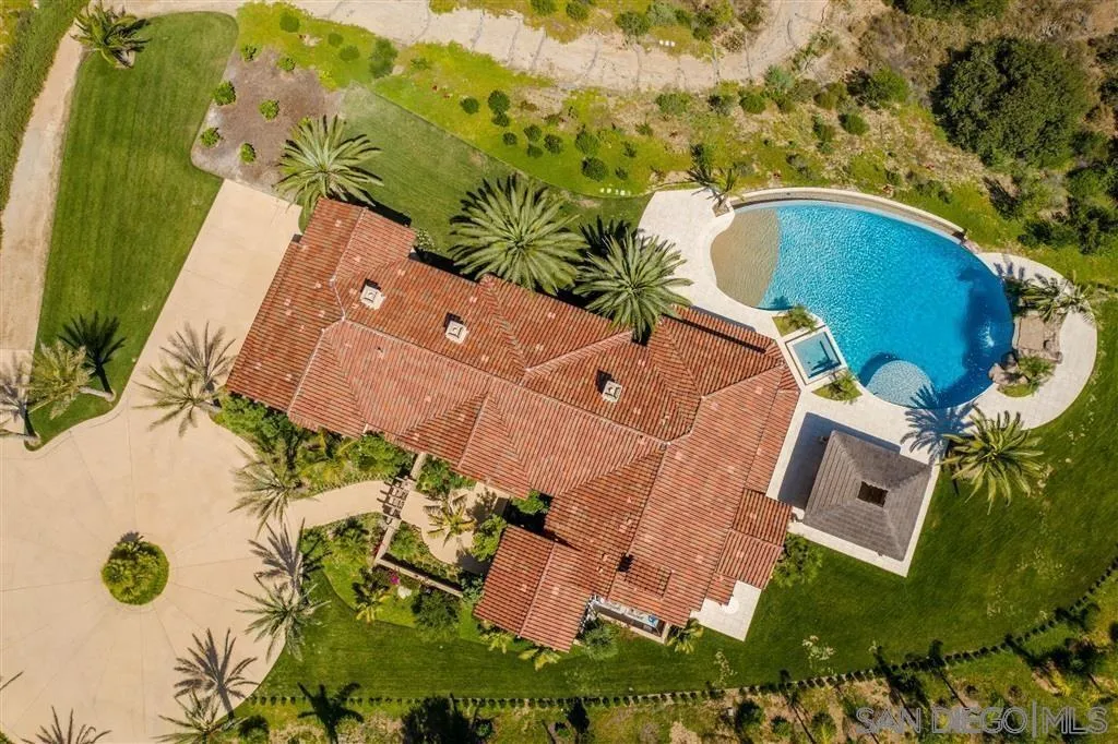 14480 Cheyenne Trail Poway, CA 92064 - Photo 5 of 23 an aerial view of a house with a swimming pool and garden