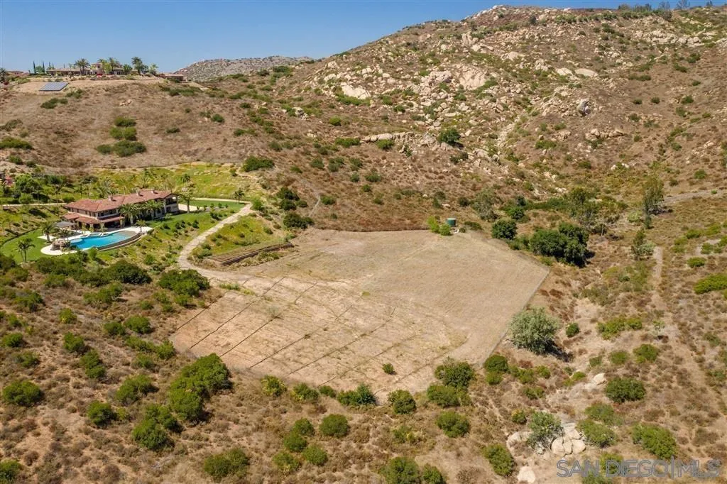 14480 Cheyenne Trail Poway, CA 92064 - Photo 7 of 23 a view of a yard with a tree