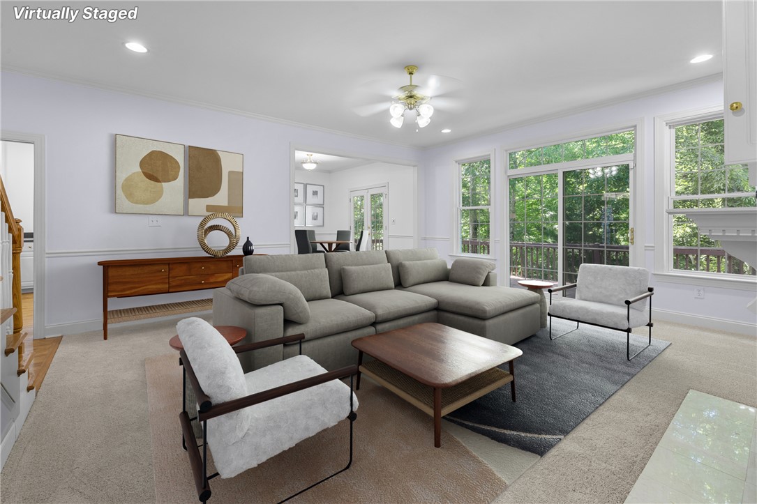 110 Brookstone Way Central, SC 29630 - Photo 14 of 46 Bright and airy living room with ample natural light, perfect for gatherings.