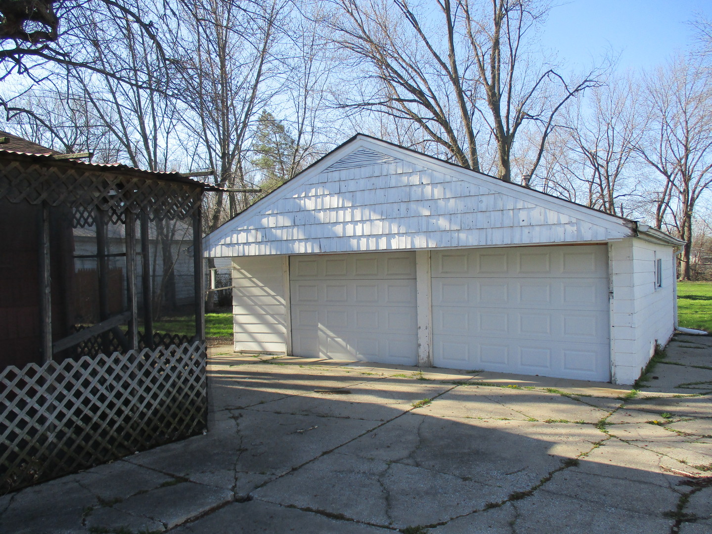 2810 186th Street Lansing, IL 60438 - Photo 2 of 14 a house with trees in front of it