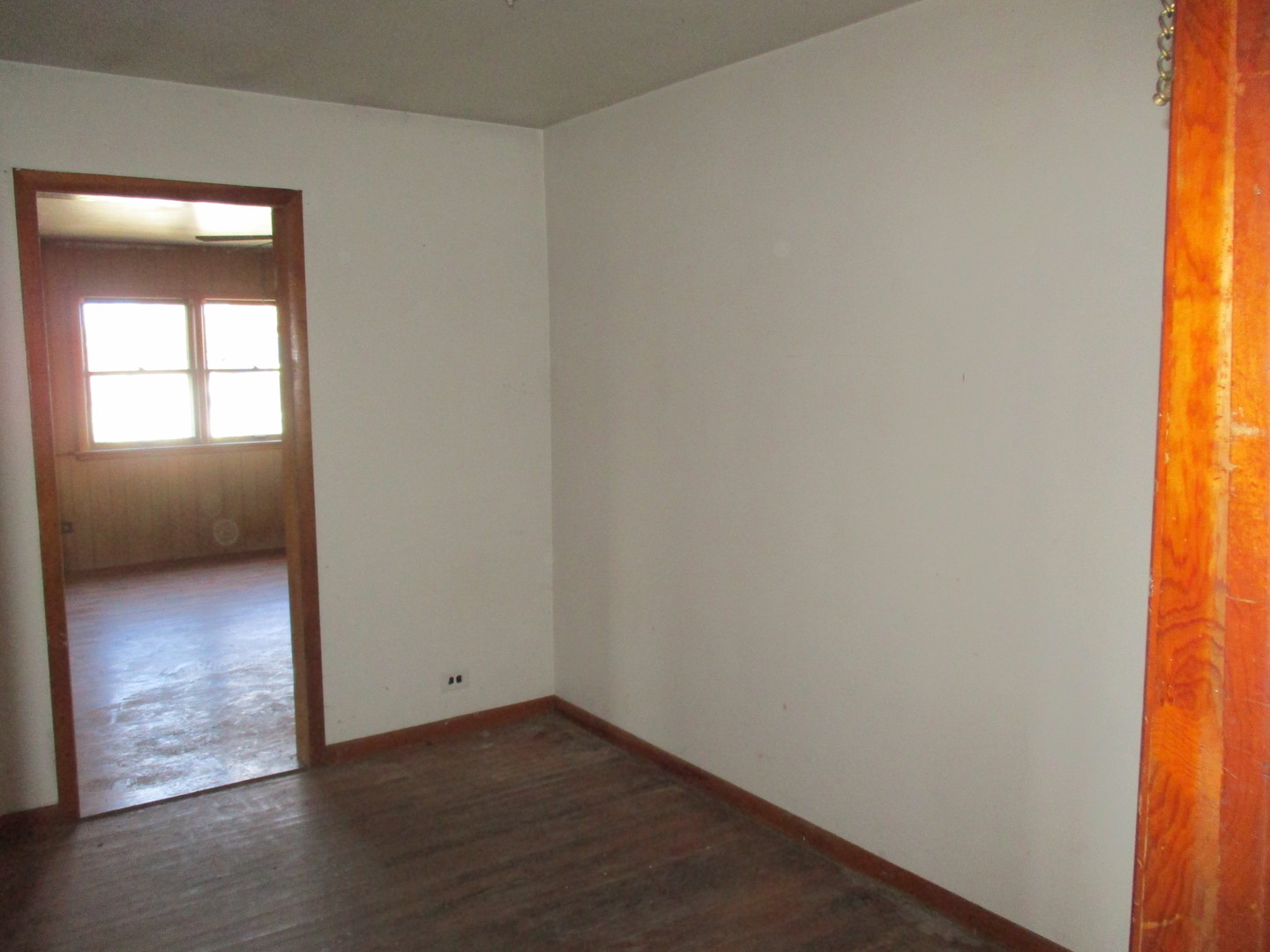 2810 186th Street Lansing, IL 60438 - Photo 10 of 14 a view of an empty room and window