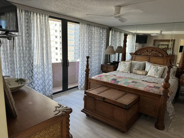 a bathroom with a tub and shower