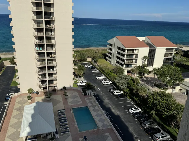 a room with gym equipment and windows