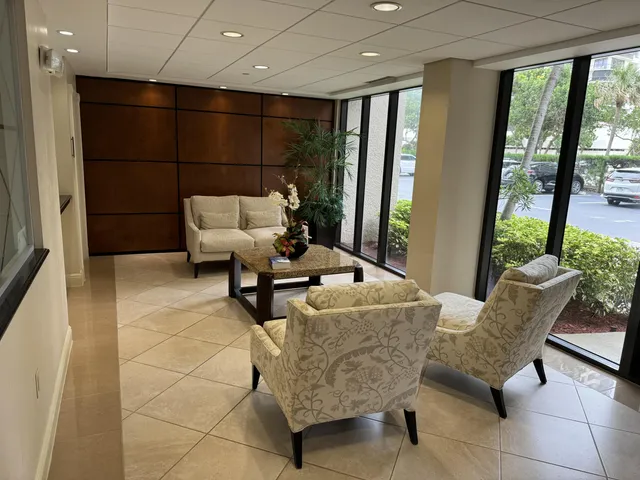 a view of street with tall buildings