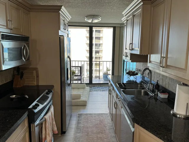 a close view of sink and stove