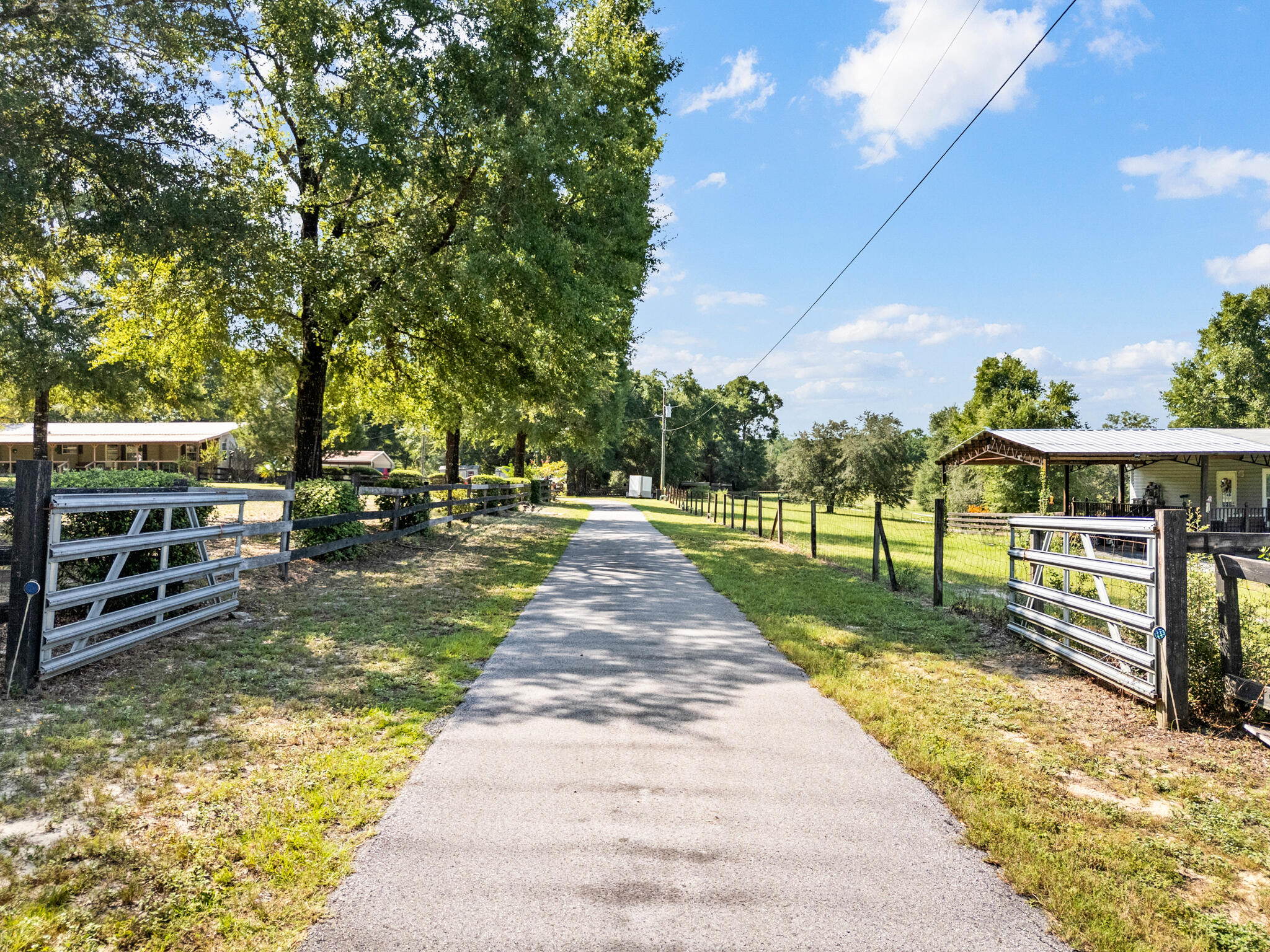 3930 Poverty Creek Road Crestview, FL 32539 - Photo 3 of 51 DJI_20260914103445_0134_D_MLS_