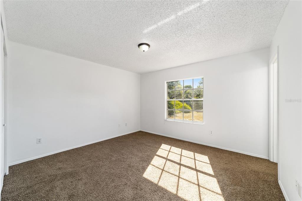 8 Ash Pass Run Ocala, FL 34472 - Photo 19 of 33 an empty room with windows