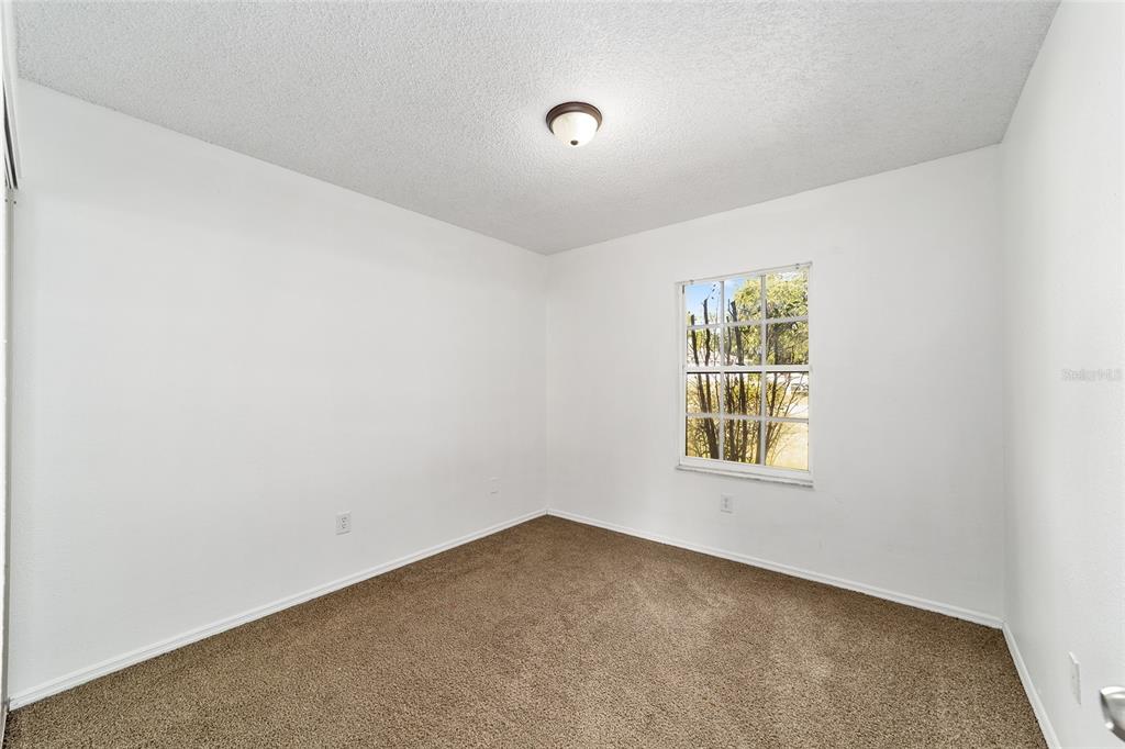8 Ash Pass Run Ocala, FL 34472 - Photo 25 of 33 an empty room with a window