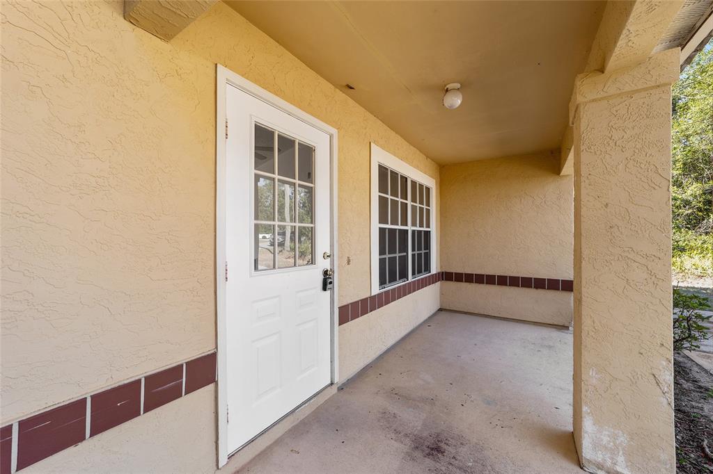 8 Ash Pass Run Ocala, FL 34472 - Photo 3 of 33 a view of an empty room with a window