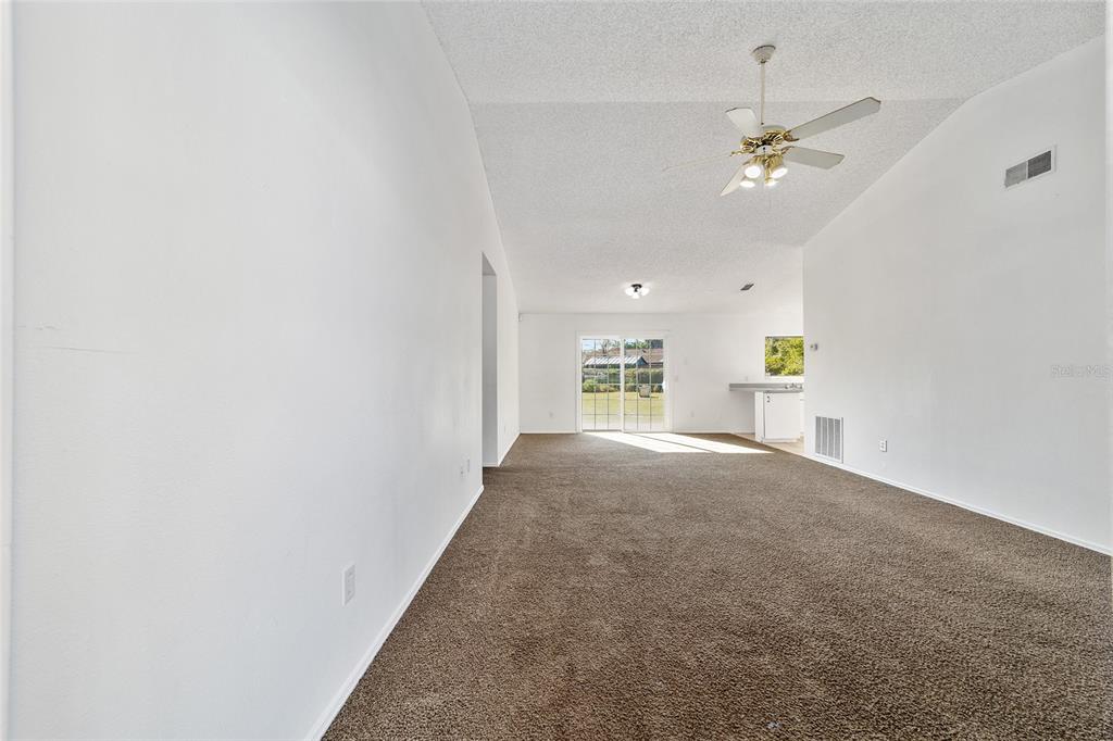 8 Ash Pass Run Ocala, FL 34472 - Photo 4 of 33 a view of livingroom and chandelier fan