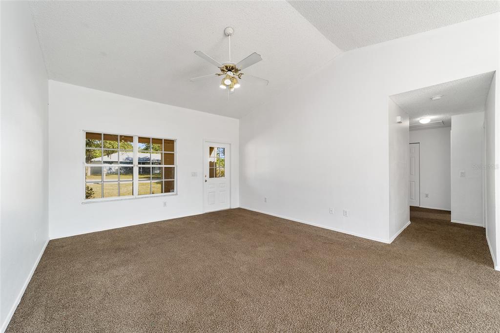 8 Ash Pass Run Ocala, FL 34472 - Photo 8 of 33 a view of an empty room with a window