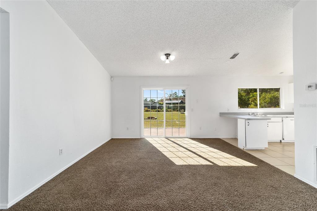 8 Ash Pass Run Ocala, FL 34472 - Photo 9 of 33 a view of an empty room with a window