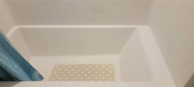 a bathroom with a bathtub