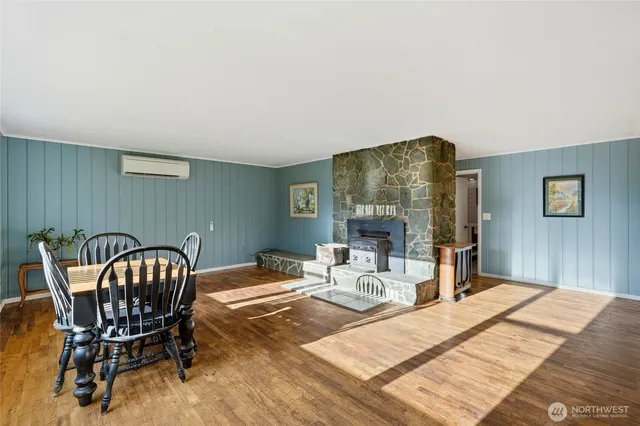 a view of a dining room with furniture window and outside view
