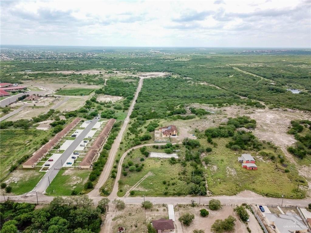 771 North Ebony Avenue Roma, TX 78584 - Photo 2 of 12 an aerial view of residential houses with outdoor space