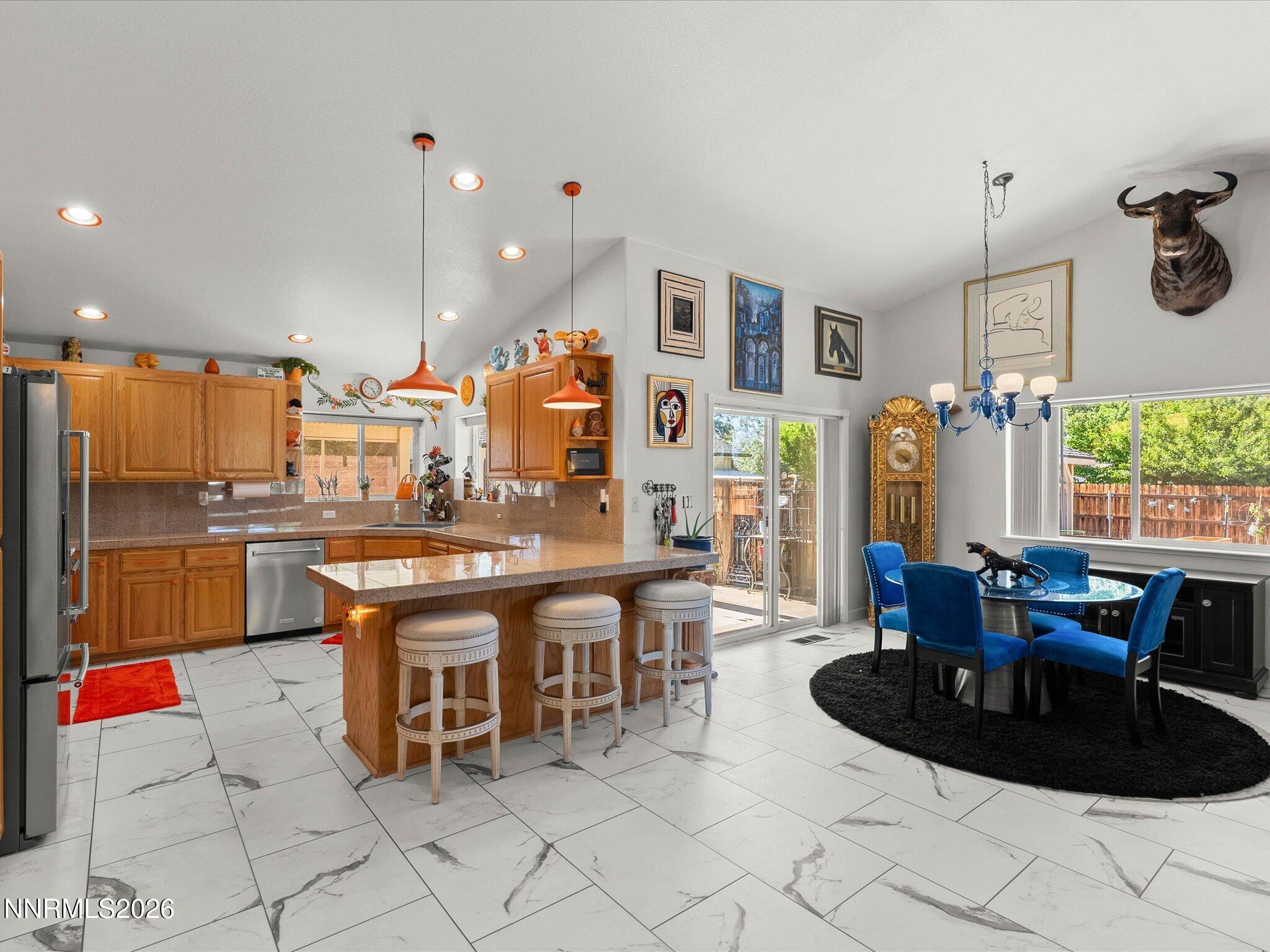 1080 Red Rock Road Fernley, NV 89408 - Photo 14 of 45 a large kitchen with a table and chairs