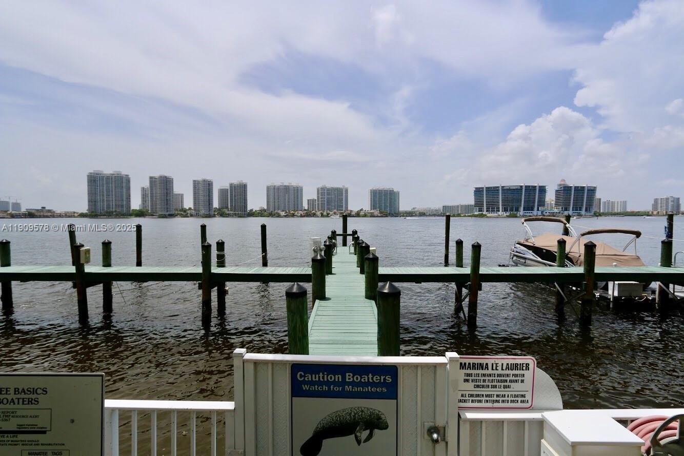 17800 North Bay Road, Unit 404 Sunny Isles Beach, FL 33160 - Photo 29 of 36 a view of a lake from balcony