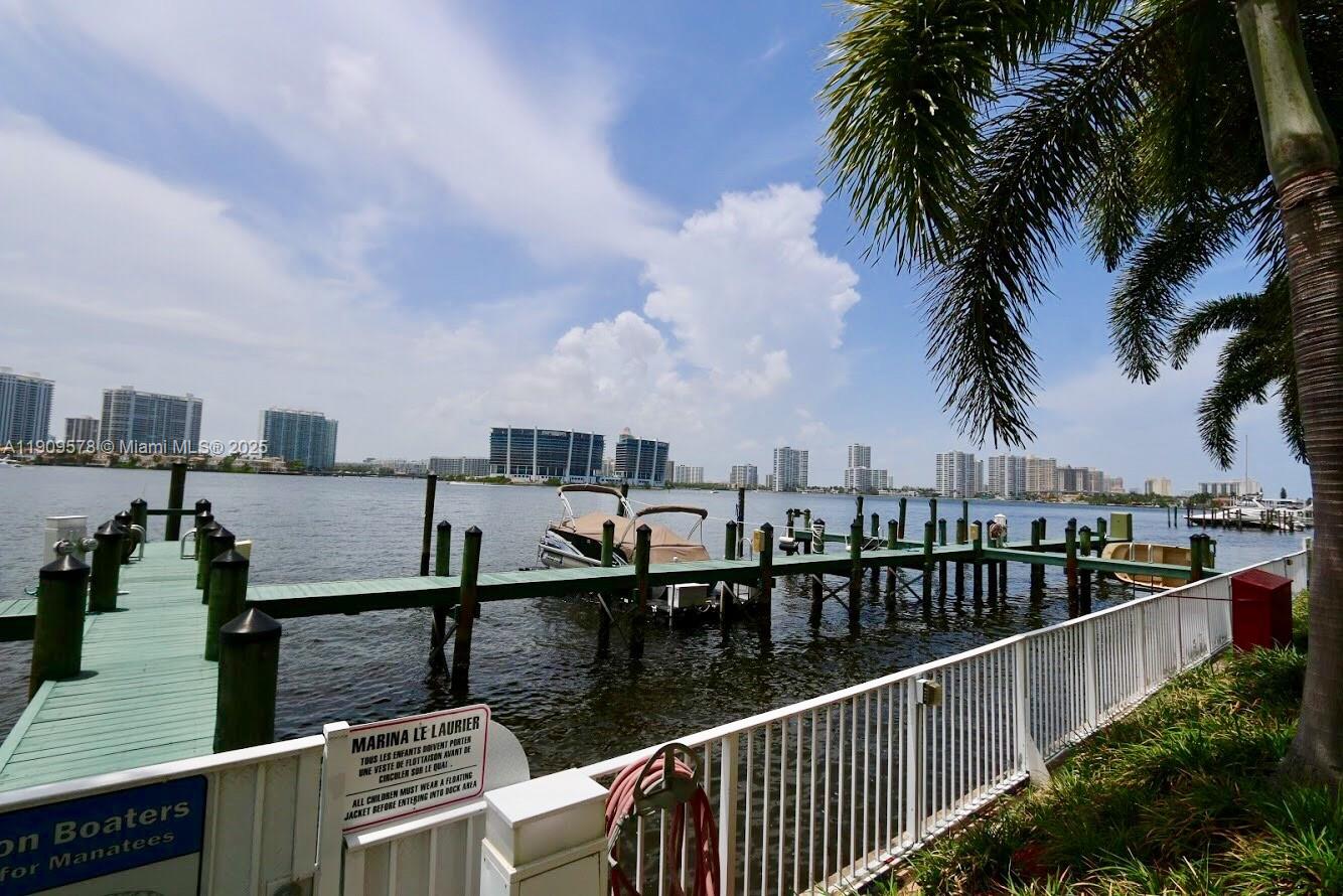 17800 North Bay Road, Unit 404 Sunny Isles Beach, FL 33160 - Photo 30 of 36 a view of a lake from a balcony