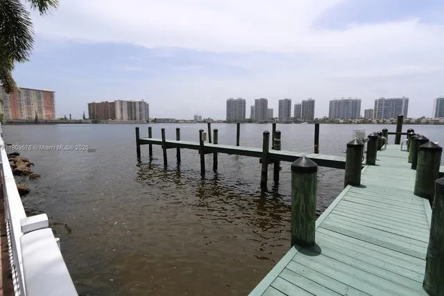 a house with palm tree in front of it