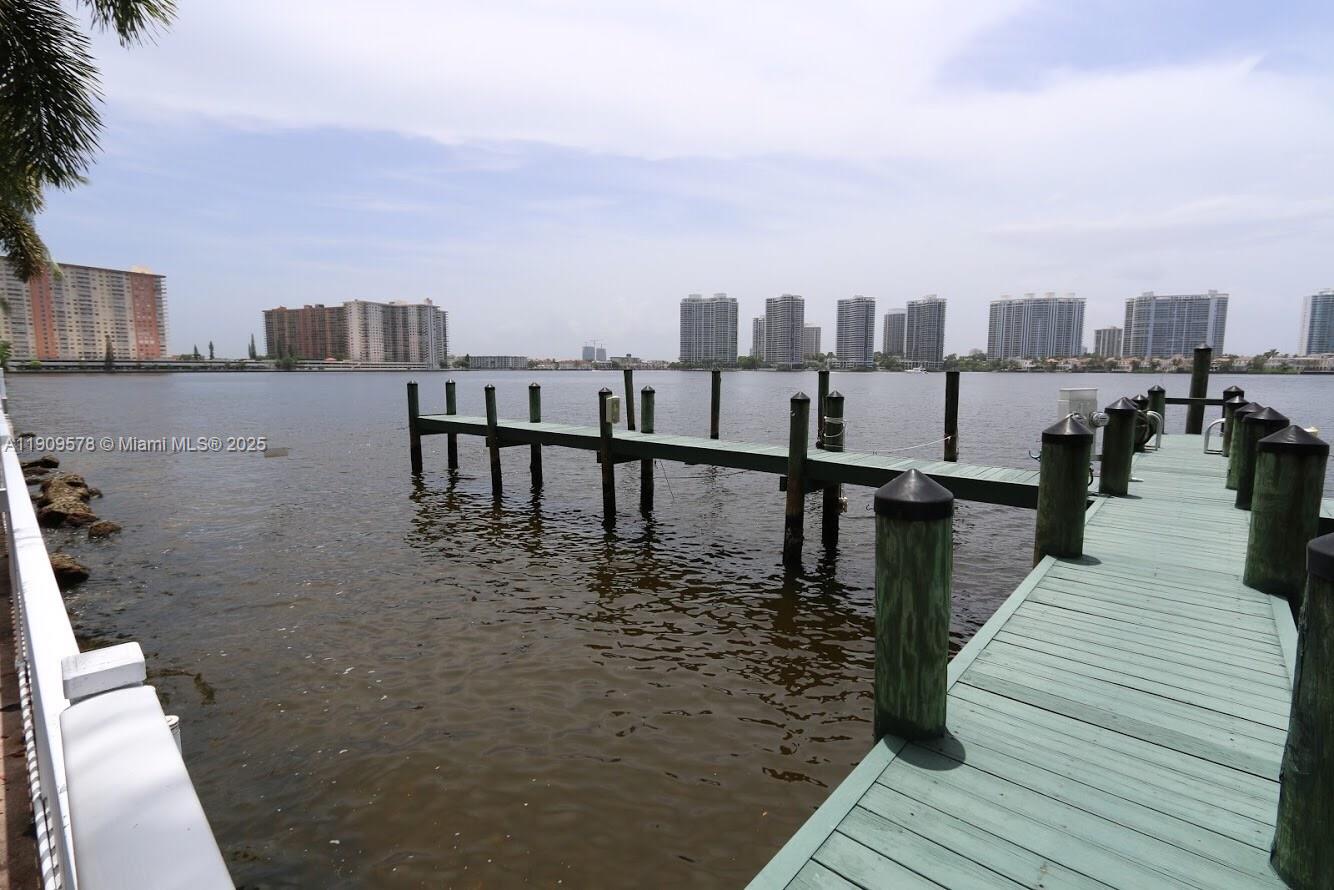 17800 North Bay Road, Unit 404 Sunny Isles Beach, FL 33160 - Photo 31 of 36 a view of a balcony with two chairs