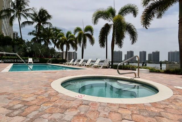 17800 North Bay Road, Unit 404 Sunny Isles Beach, FL 33160 - Photo 35 of 36 a view of outdoor space yard and swimming pool